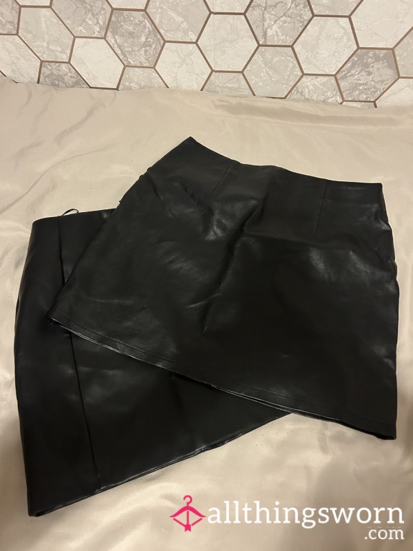 2 Used Black Leather Skirts