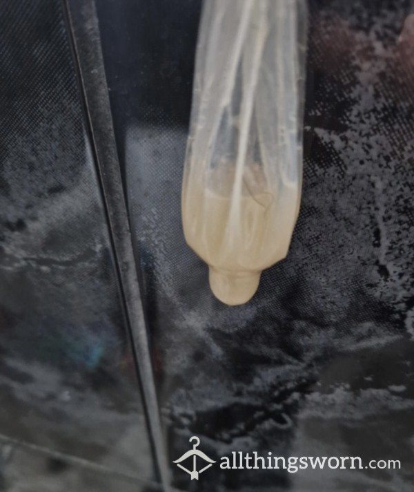 Alpha’s C*m Filled Condom