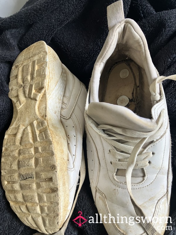 Battered White Trainers