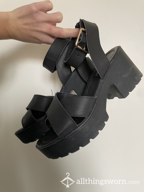 Black Heeled Sandals Worn By Blonde Goddess