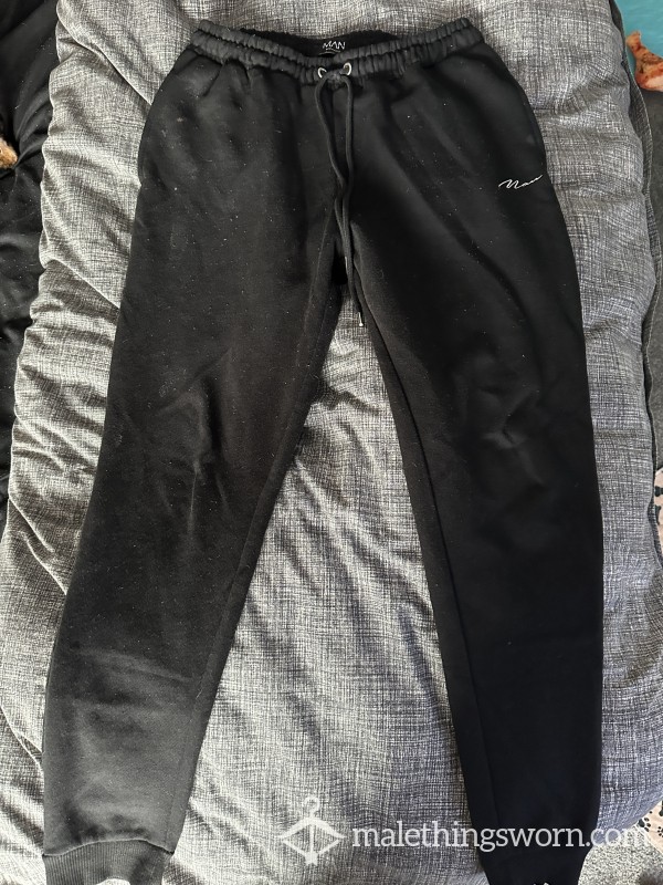 Black ‘Man’ Joggers - Size M