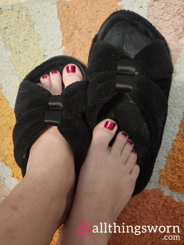 Black Slippers Indented With Feet