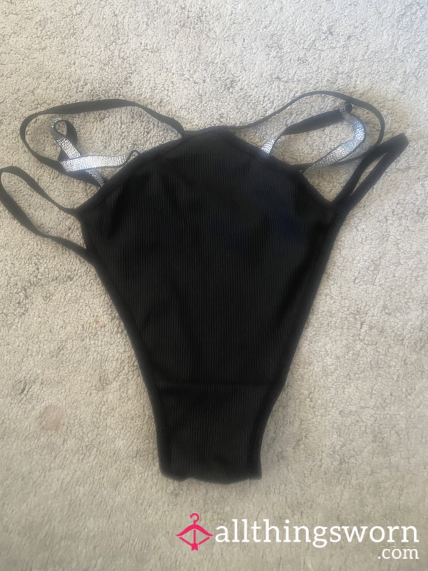 Black Thong With Detail On Straps