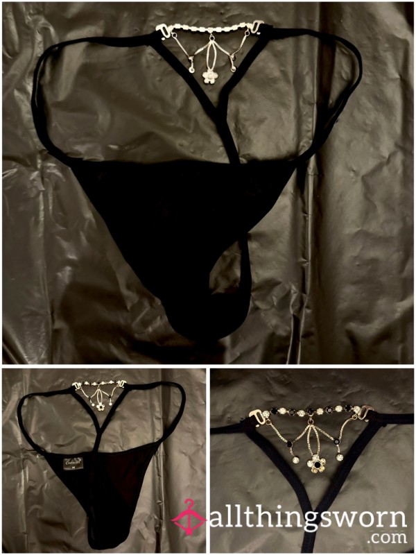 Black Thong With T-spot Insert. Used But Not Damaged. Size Medium