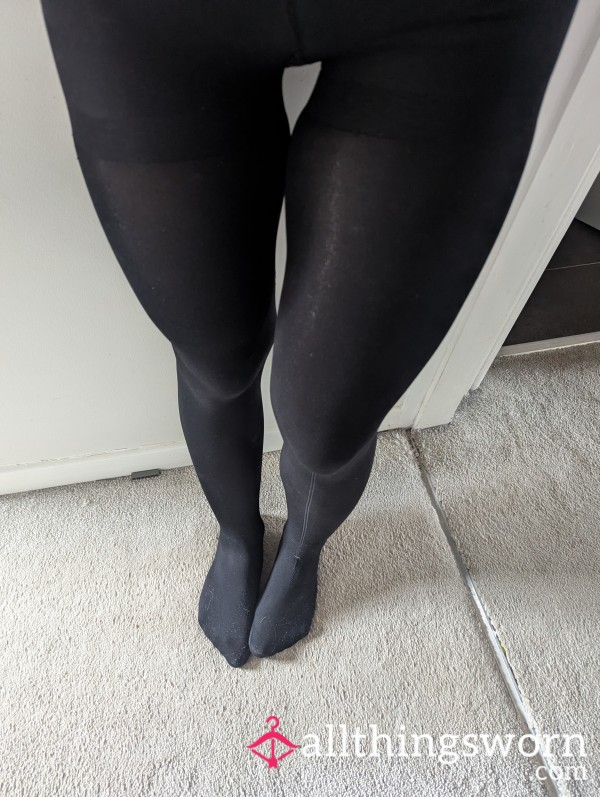 Black Tights With A Small Hole