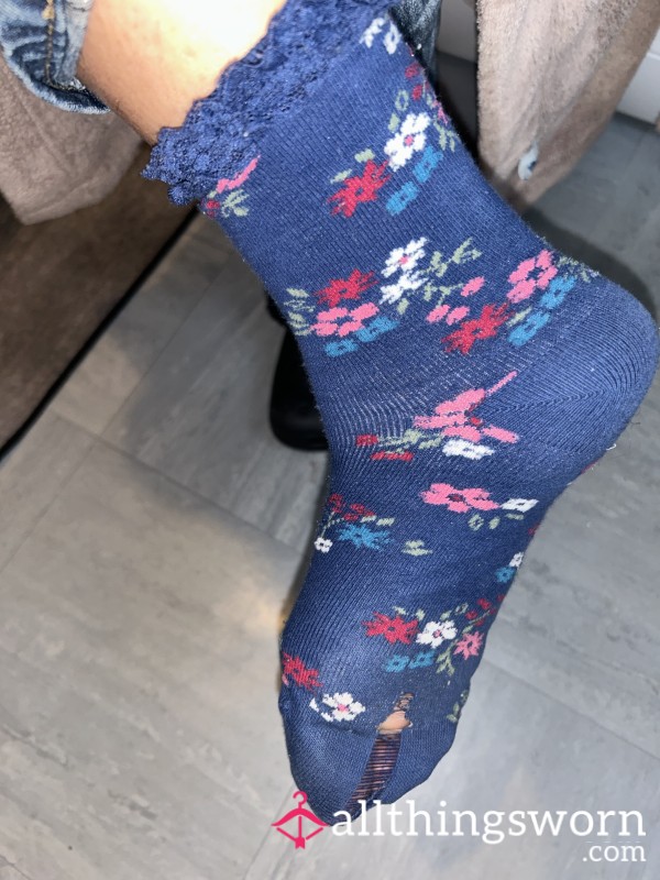 Blue Flowery Old Socks With Holes