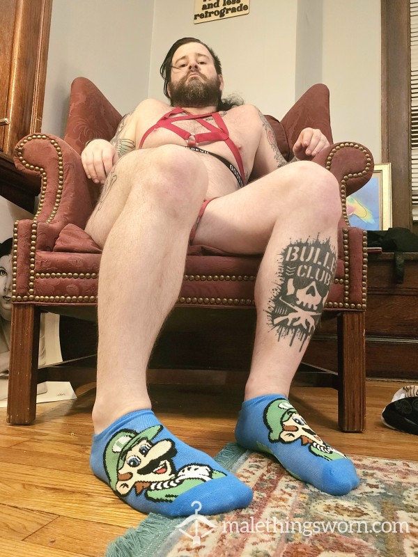 Blue Luigi Socks Worn By Sweaty Powerlifter