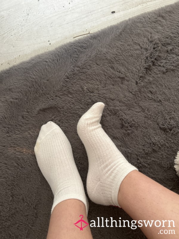 Extremely Worn Mismatched Socks