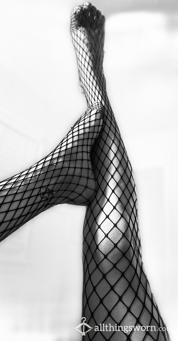 Feet In Fishnets