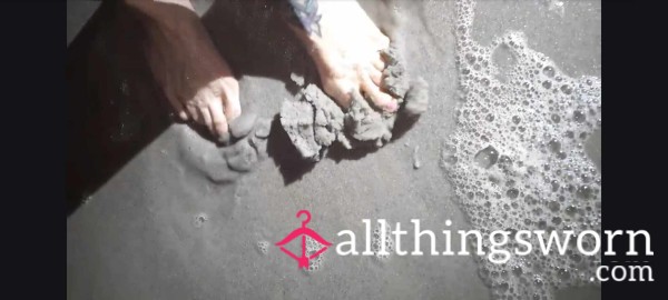 Sandy Feet On The Beach