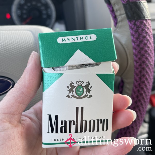 Half Smoked Pack Of Cigarettes