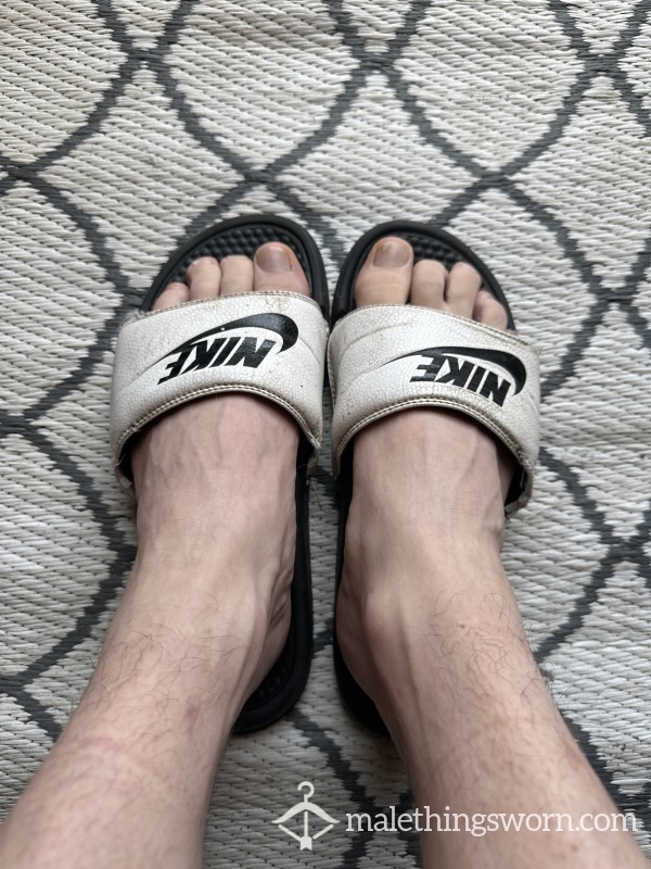 Heavily Worn Nike Sliders