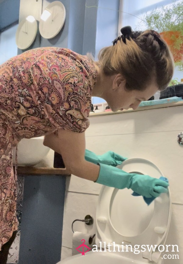 Housewife Cleaning Bathroom Wearing Green Rubber Gloves