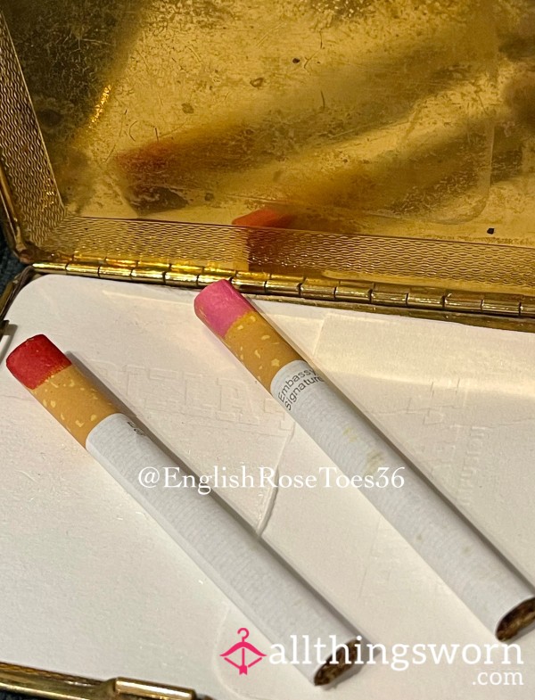 Lipstick Stained Cigarette Bu*ts