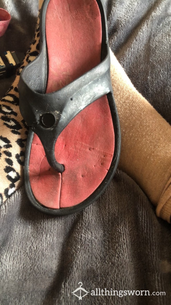 One Very Old Worn Looking Flip Flop