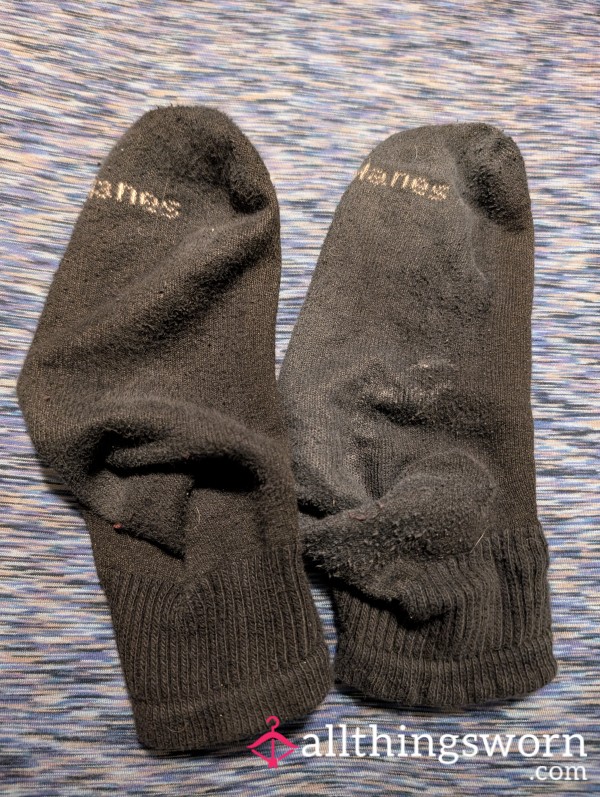 Pair Of Worn Black Socks