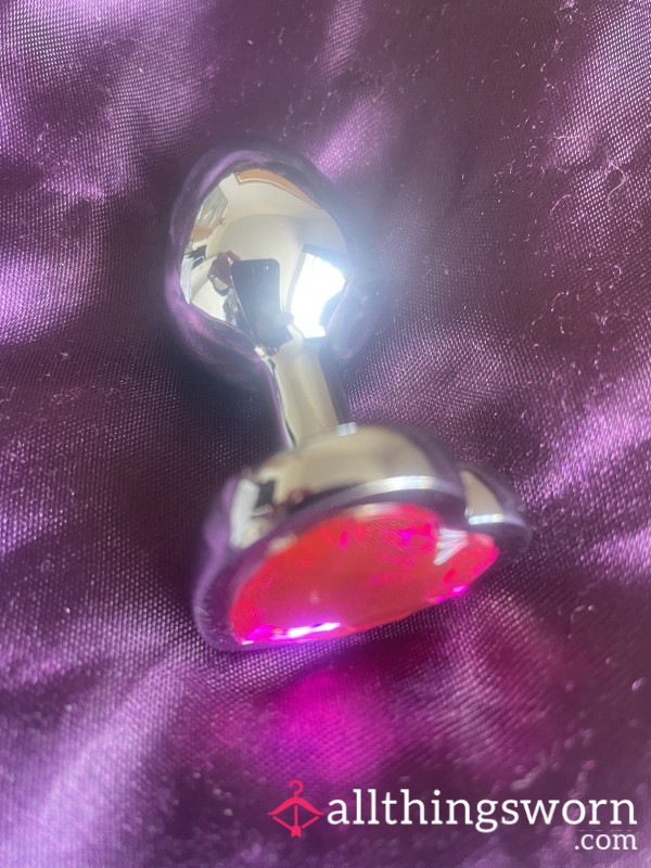 Small Used Metal But Plug With Pink Heart Gem