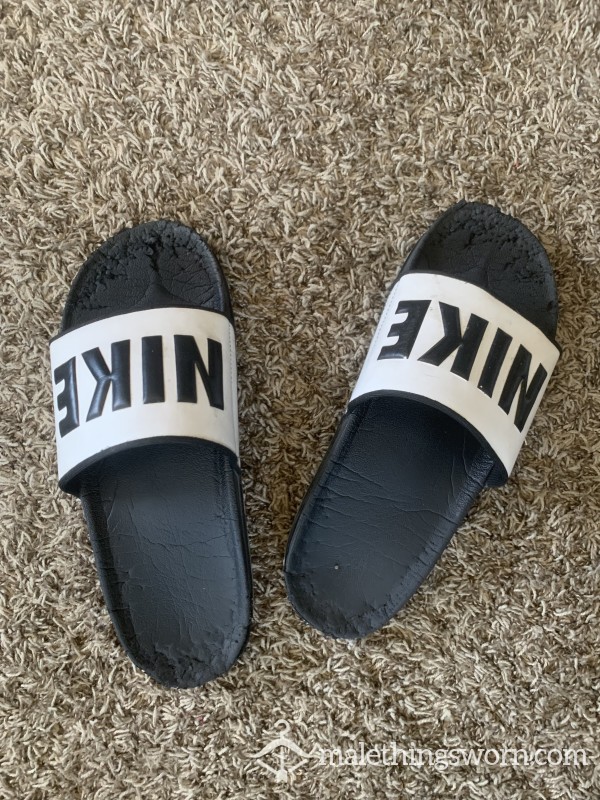 Trashed Nike Slides