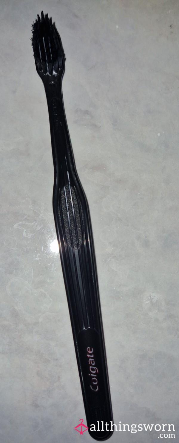 Used Black Toothbrush