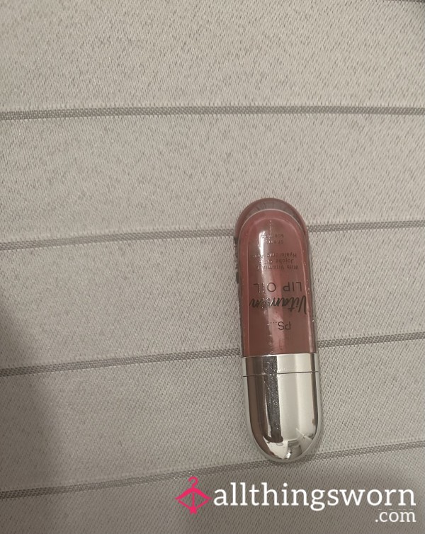 Used Cherry Scented Lip Oil