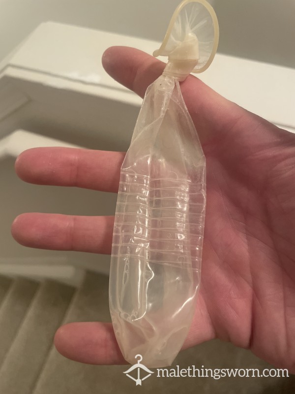 Used Condom Filled With C*m