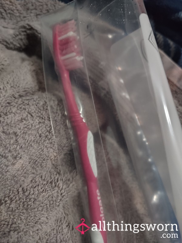 Used Pink Toothbrush