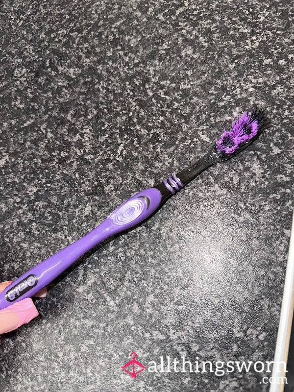 Used Purple Toothbrush