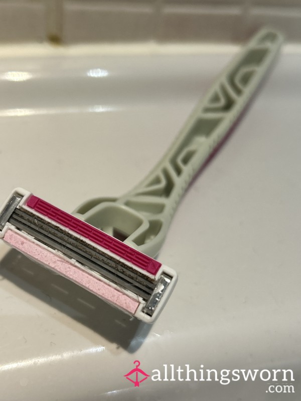 Used Razor With Lots Of Hairs