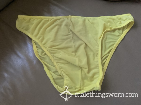 Used Well Worn Yellow Semi-Sheer Swim Brief, Size Medium