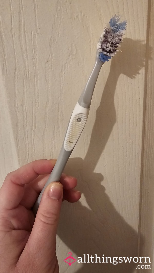 Used/Worn Toothbrush