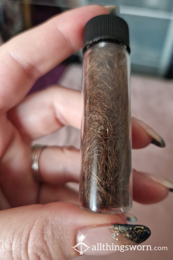 Vial Of Long Brunette Hair