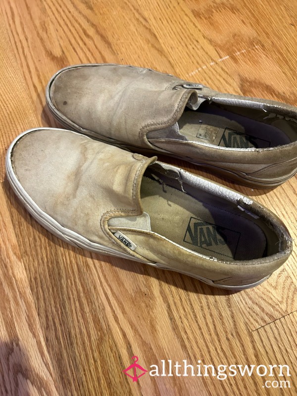 Well-loved Van's Slip Ons