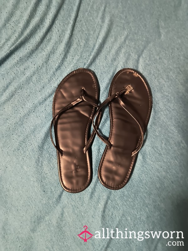 Well Worn Black Flip Flops