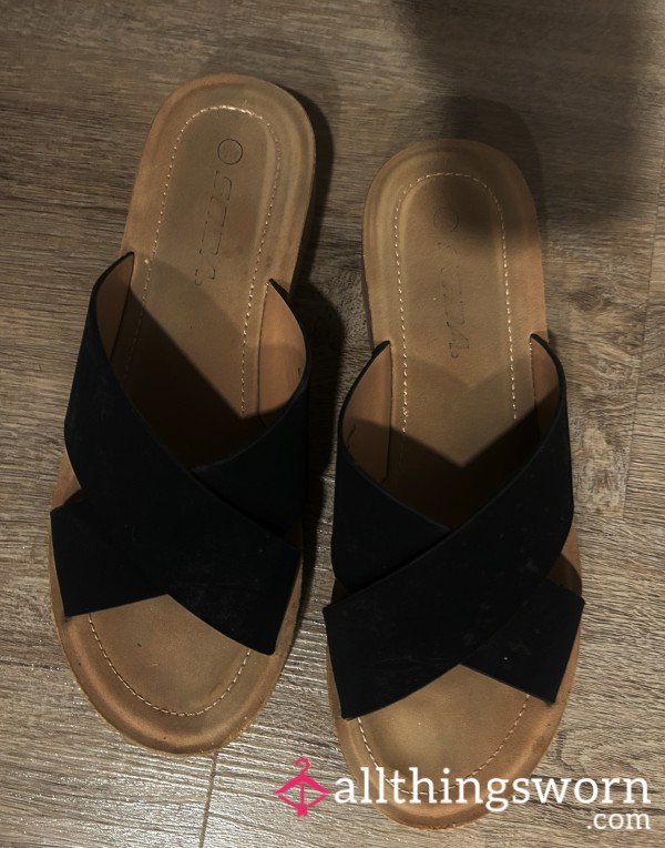 Well-Worn Black Sandals: A Foot Lover’s Dream