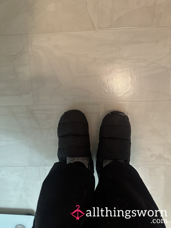 Well Worn Black Slippers