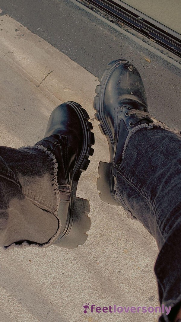 Well Worn Boots With Hole In Top Of Them