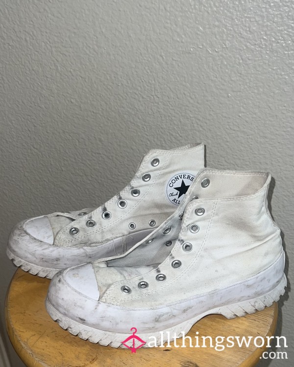 Well Worn Converse With Tear