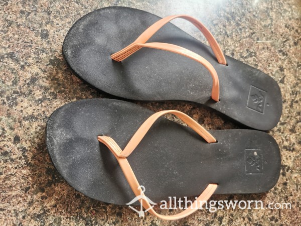 Well Worn Flip Flops With Imprints