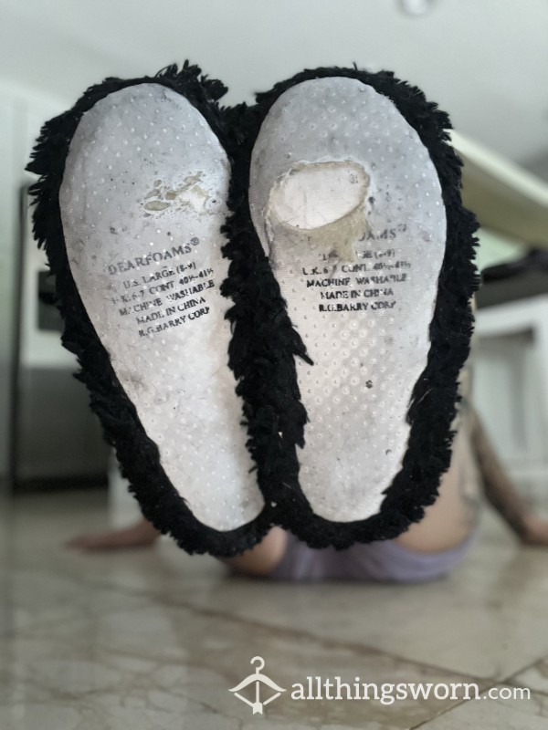 Well-worn Fluffy Black Slippers