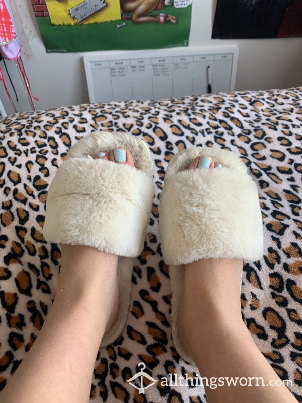 Well Worn Fluffy White Slippers