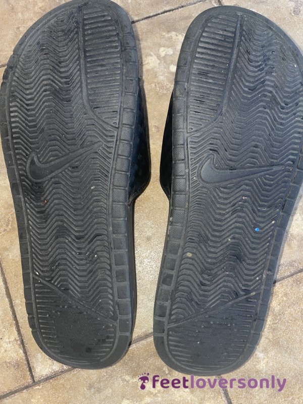 Well Worn Nike Slides