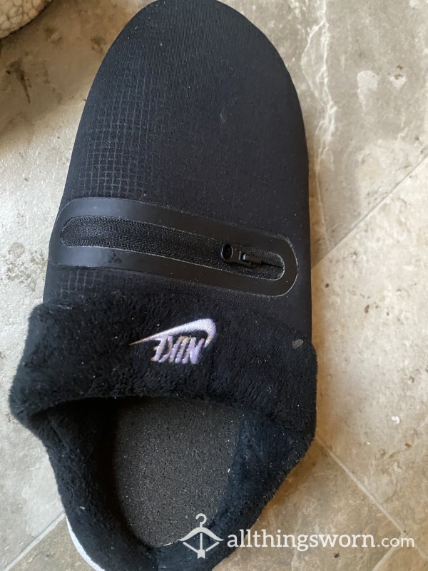 Well Worn Nike Slippers