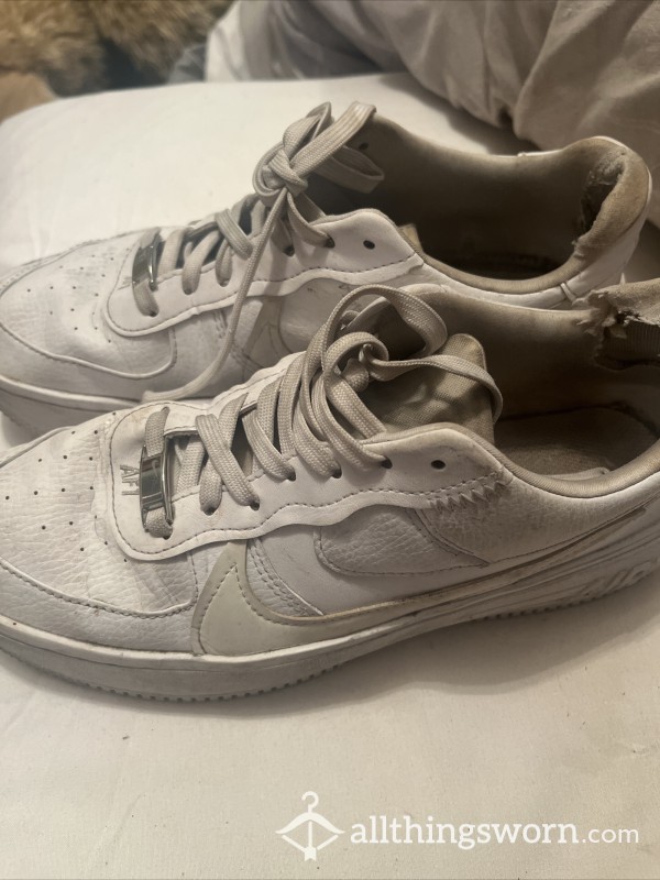 Well Worn Nike Trainers