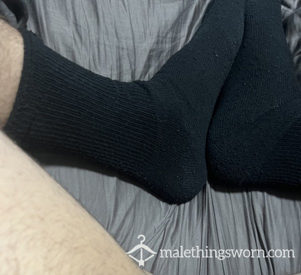 Well Worn Pair Of Black Socks