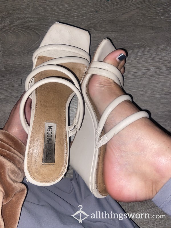 WELL-WORN WHITE HEEL SANDALS