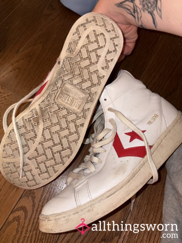 Well-worn White High Top Sneakers