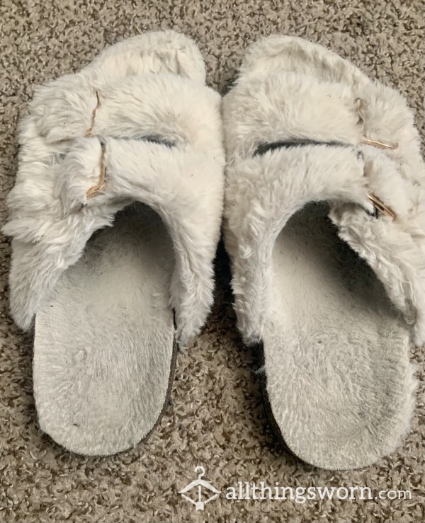 Well-worn White Slippers