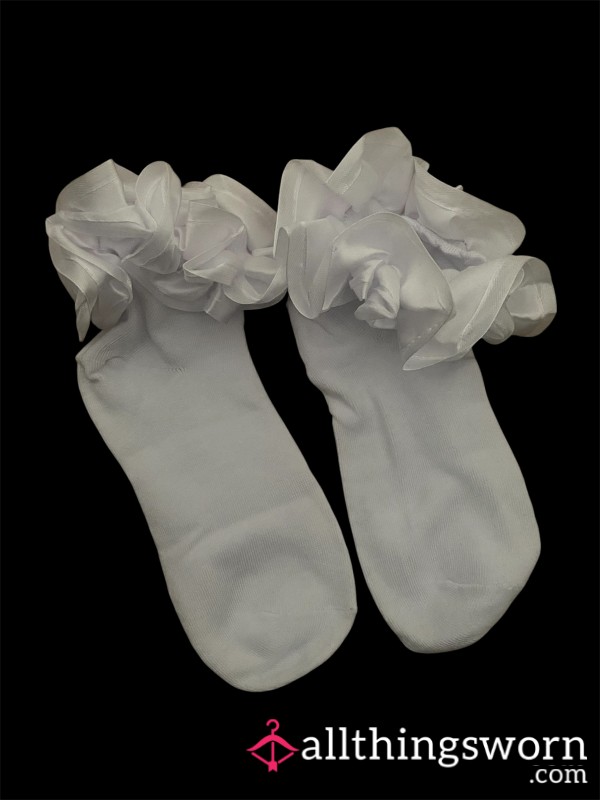 White Frilly Socks Ready To Be Worn