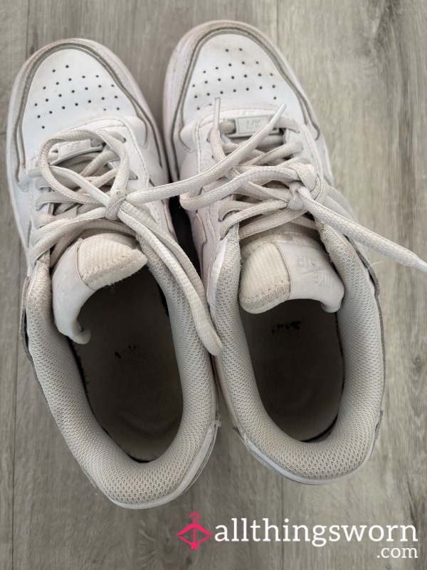 White Nikes Worn By Young Girl