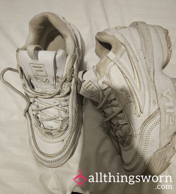 Worn And Pungent Fila Trainers In A UK Size 5